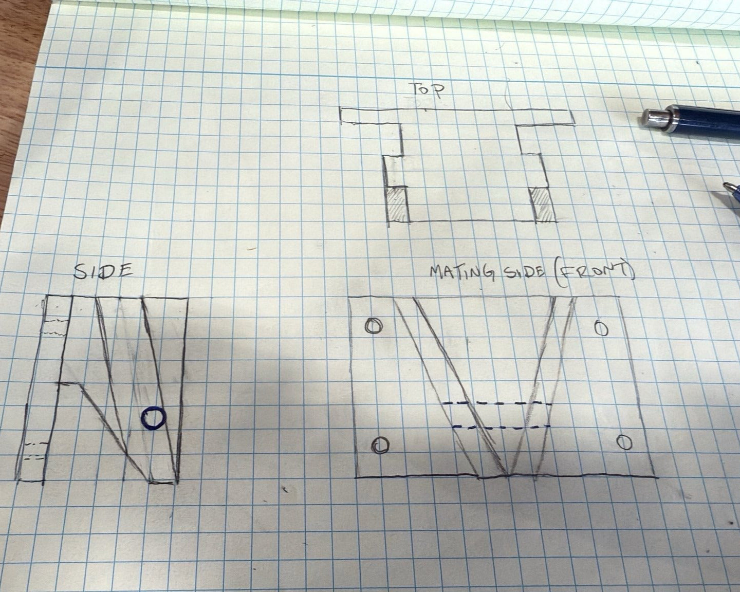 Technical drawing on grid paper with measurements and annotations.